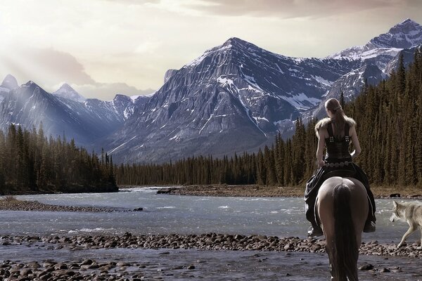 Guerrier sur un cheval avec un loup près des montagnes