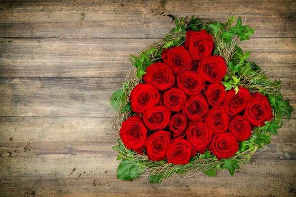 A heart-shaped bouquet of red roses