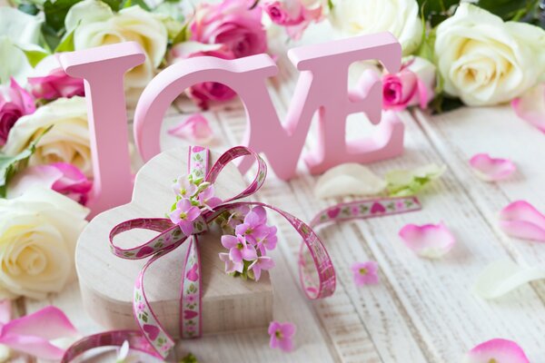 Pink inscription love with roses