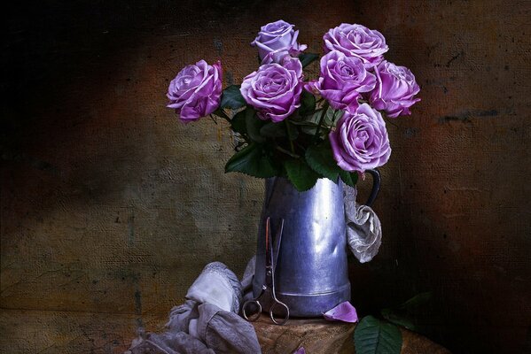 Vintage still life of a rose in a tin