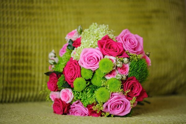 Bouquet of pink roses with greenery