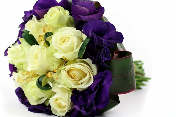 Bridal bouquet of white roses and purple flowers on a white background