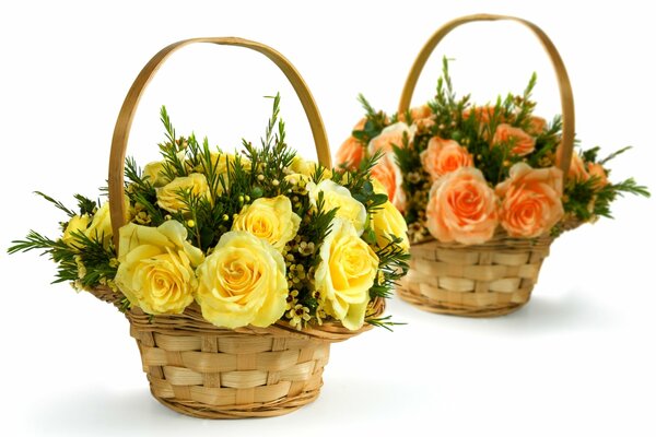 Baskets with yellow and rose roses