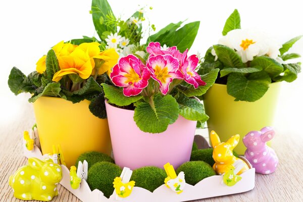 Easter still life with rabbits and flowers