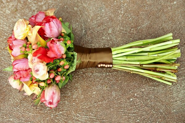 Beautiful bouquet of ranunculus with multicolored flowers-red, pink, green