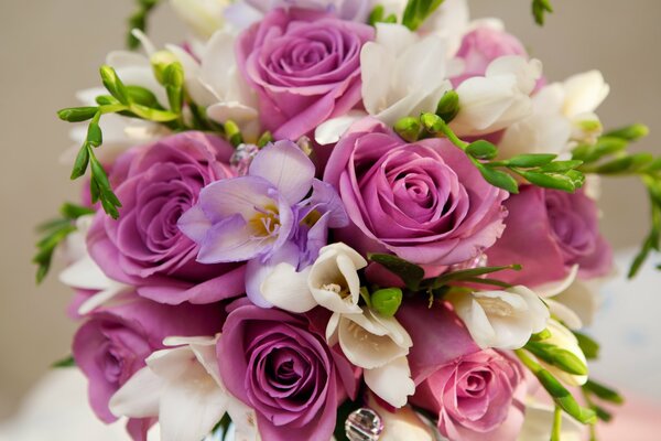 Wedding bouquet with roses and white flowers