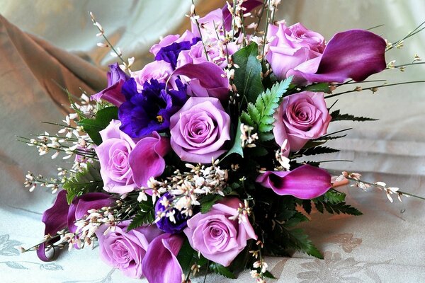 Beautiful bouquet of roses and calla lilies