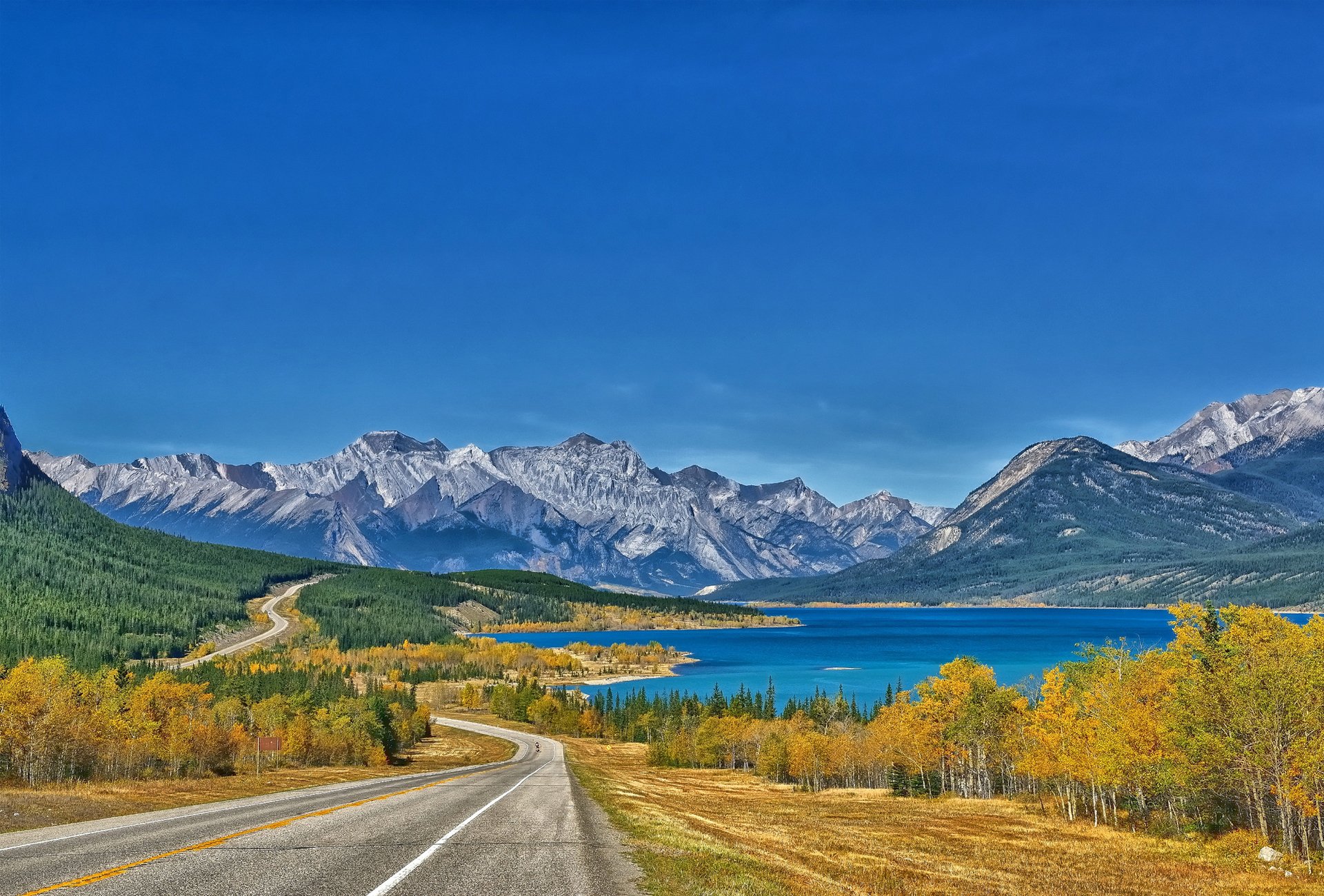 abraham lake lake road mountain landscape