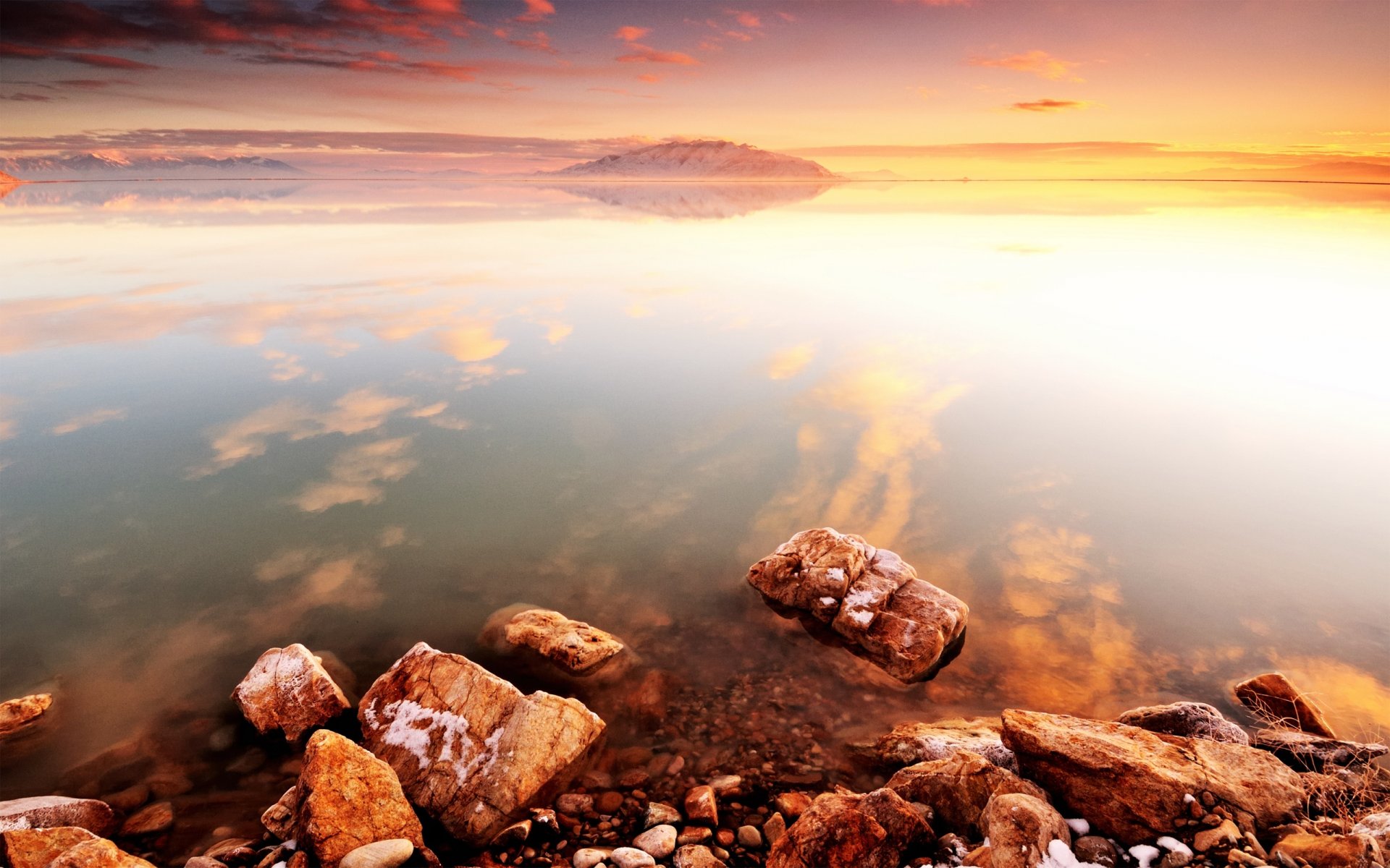 ea dawn stones surface of distant shore mountain