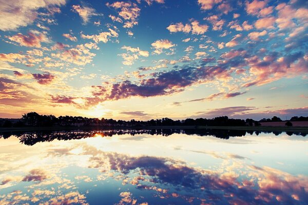 Reflection of clouds at sunset