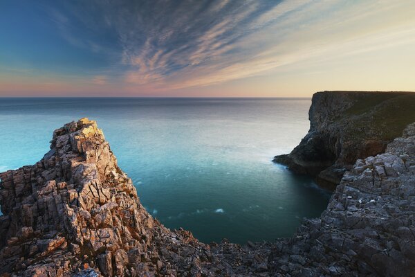 Cliffs overlooking the blue ocean