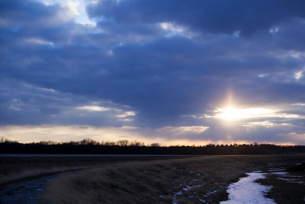 The horizon of the blue sky with the sun