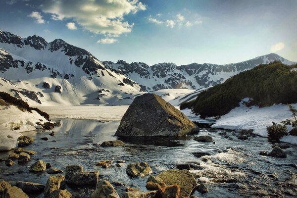 Winter landscape with mountain peaks