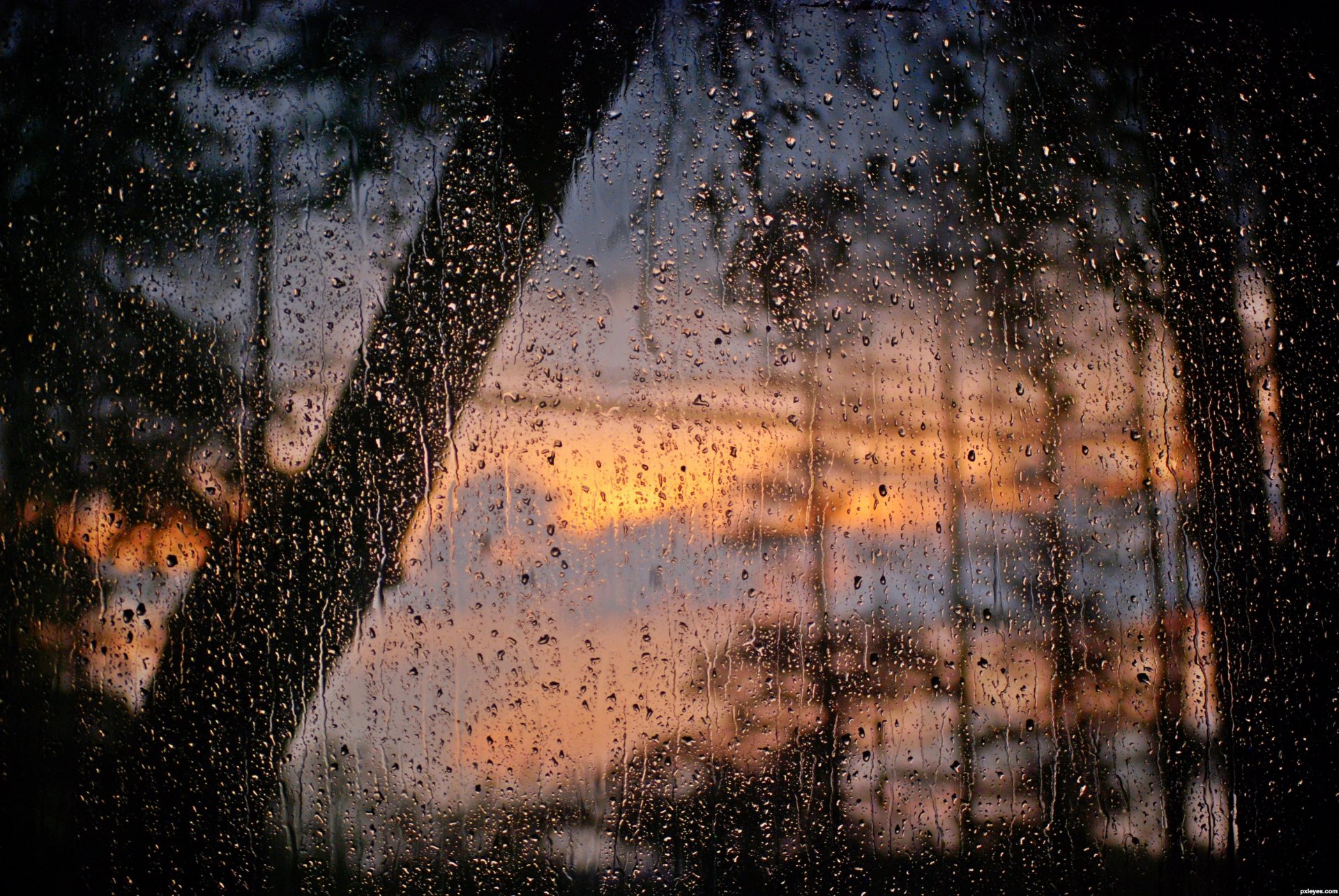 after the rain glass window water drop