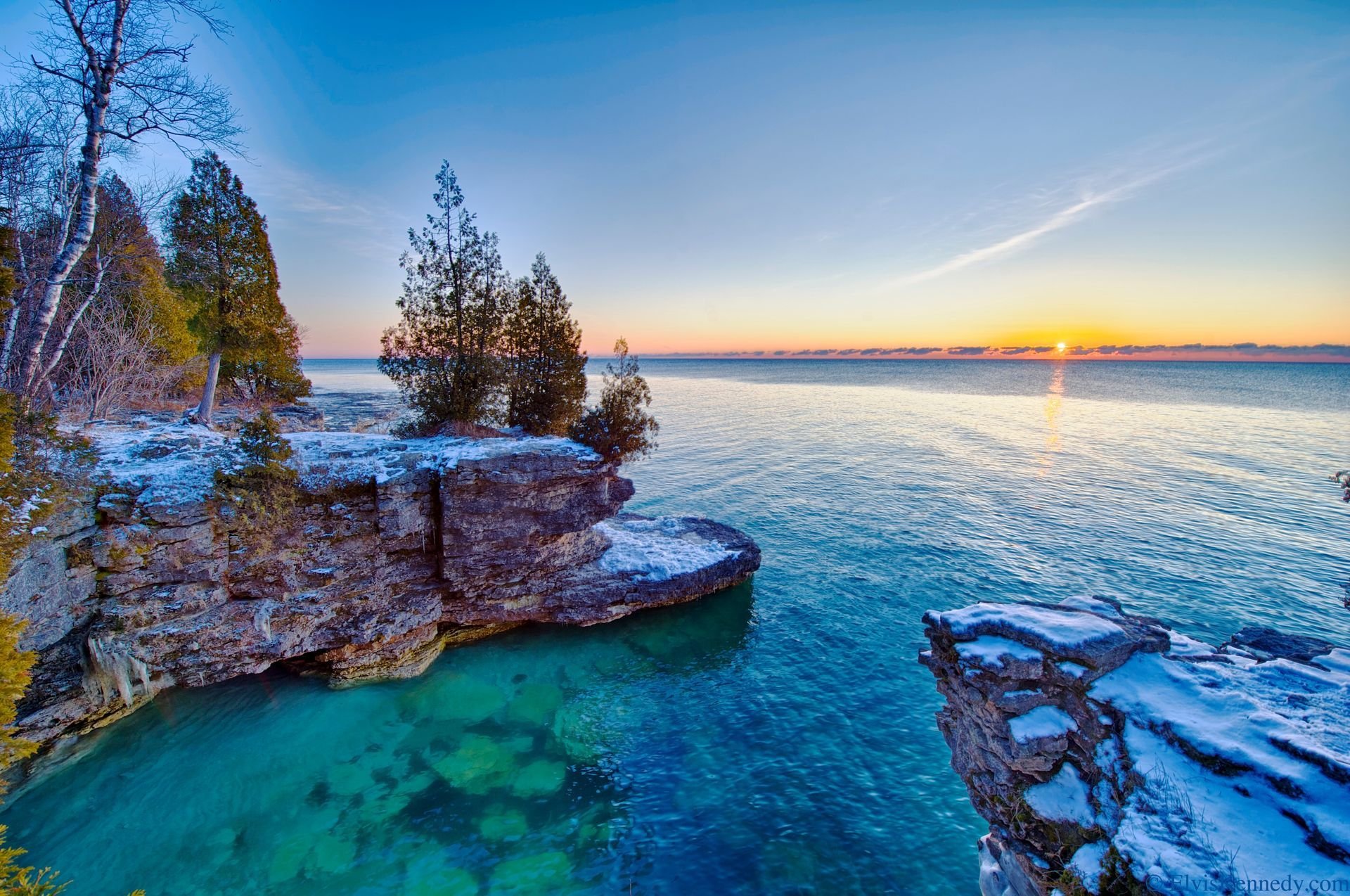 lago michigan amanecer rocas árboles