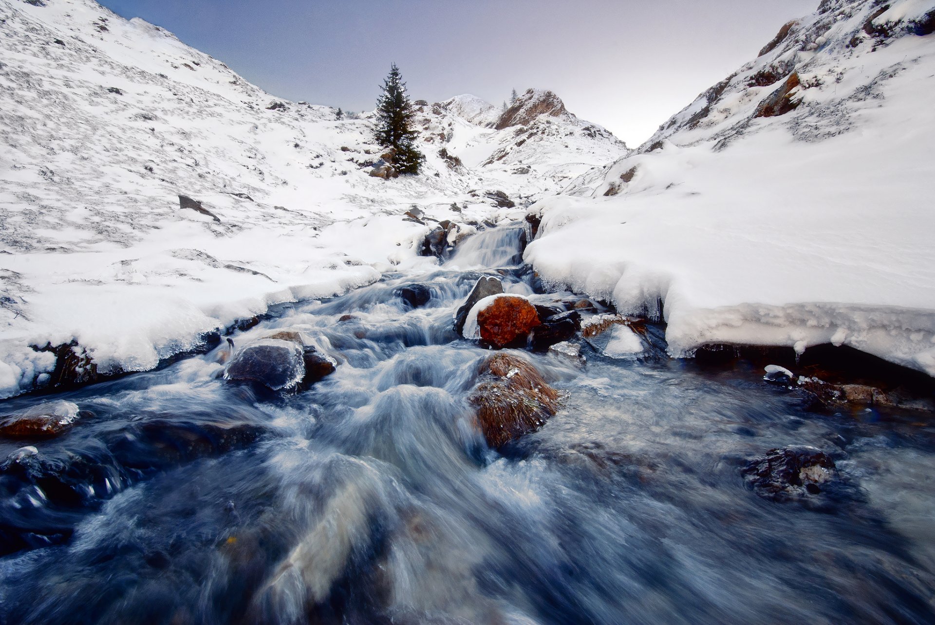 nature rock river flows stones snow