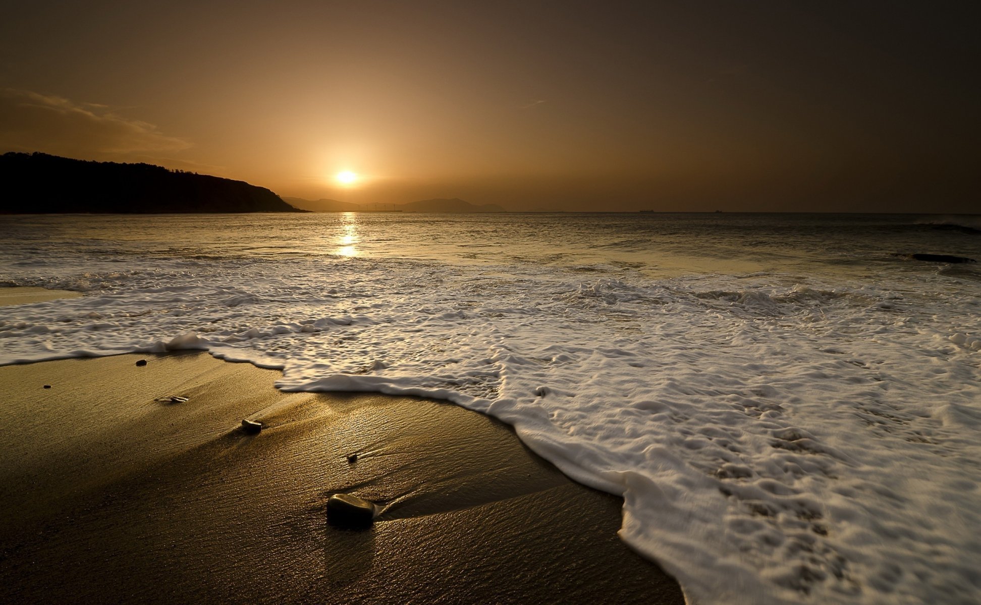 natur landschaft sand meer wellen steine sonnenuntergang