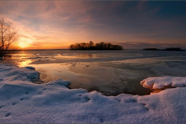 Winter evening on the lake in the world