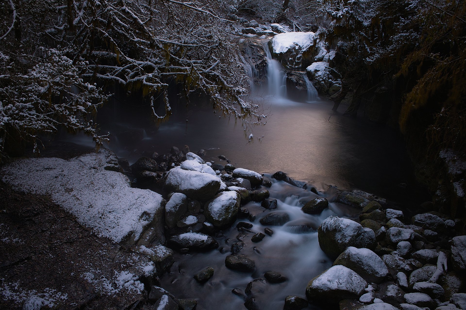 nature river flows stones snow eclipse