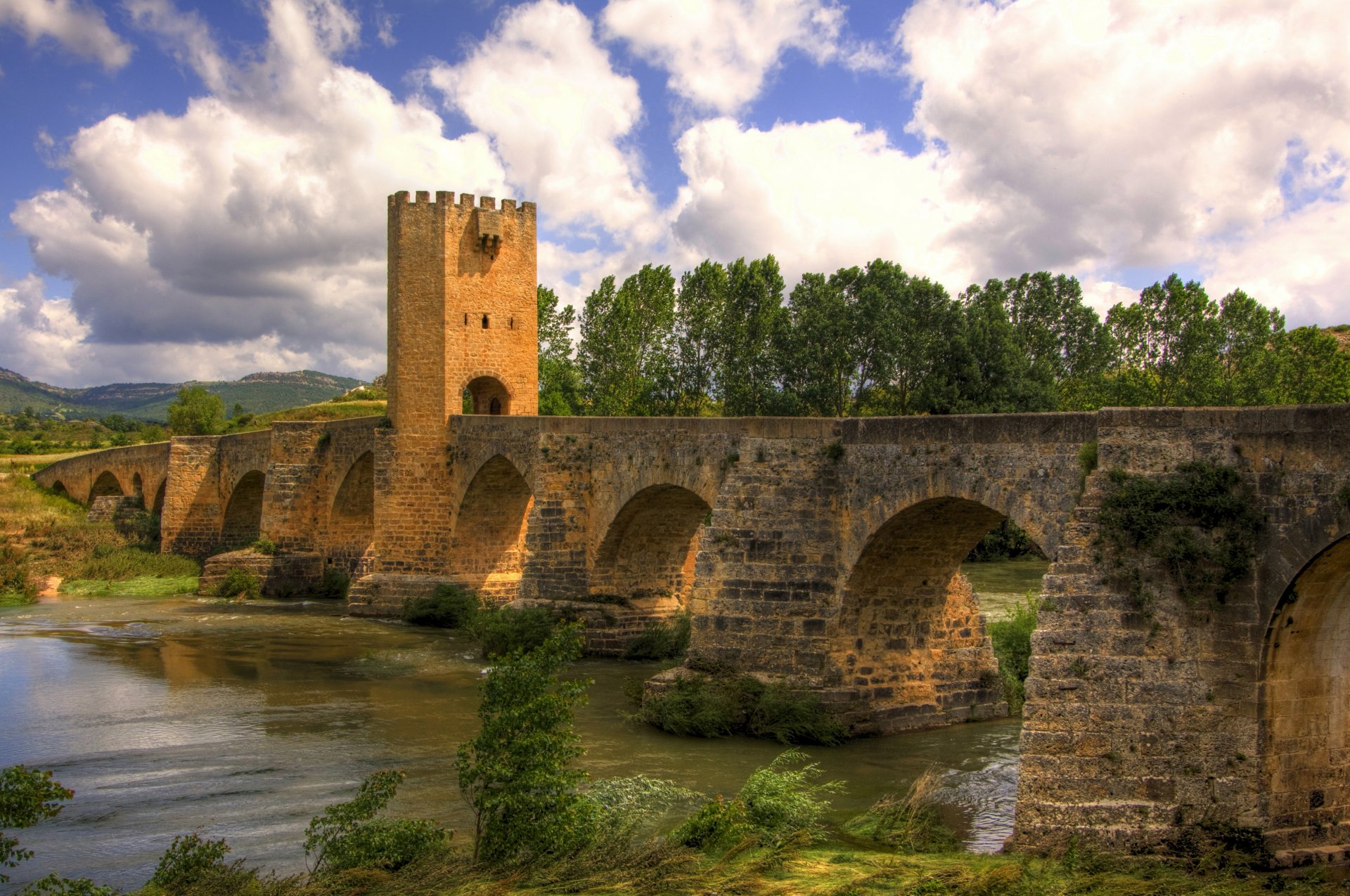 pain frias bridge tree river blue sky clouds landscape