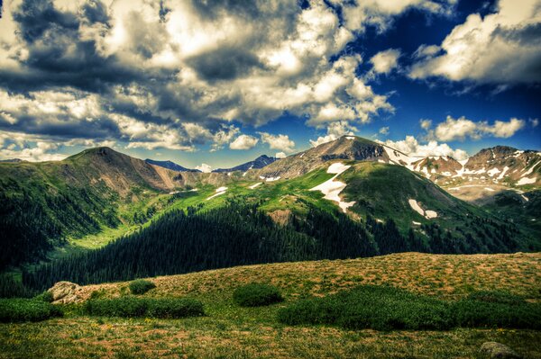 Mountain lawn under the blue sky