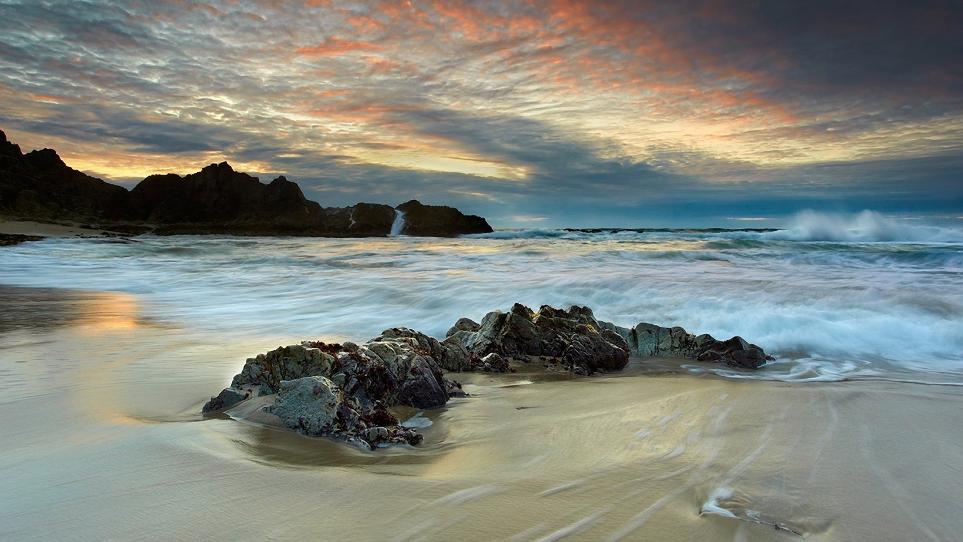 mar rocas costa rocas puesta de sol nubes olas