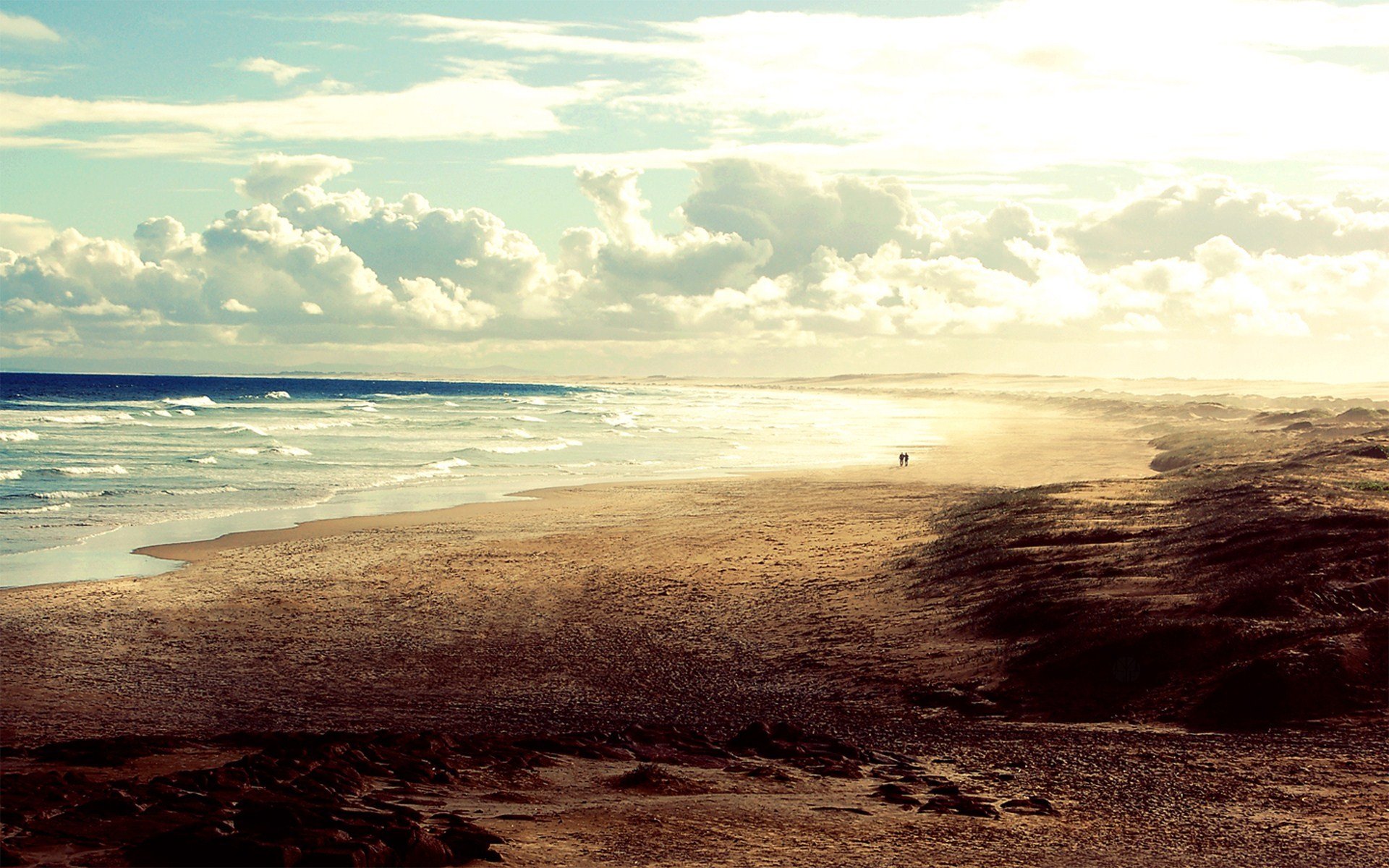 playa olas océano arena cielo horizonte gente paseo paisaje