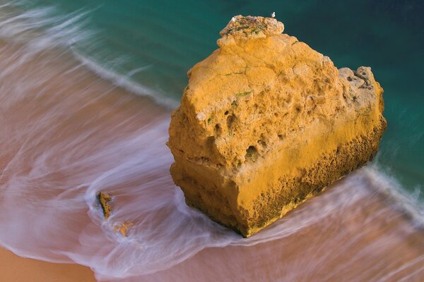 A rock in the middle of the ocean, the power of nature