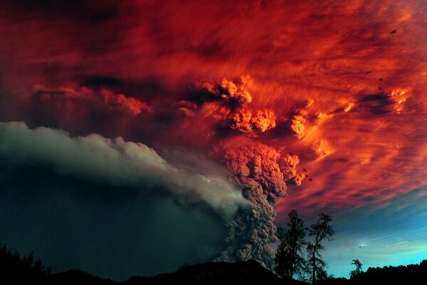 Volcanic eruption in the red sky