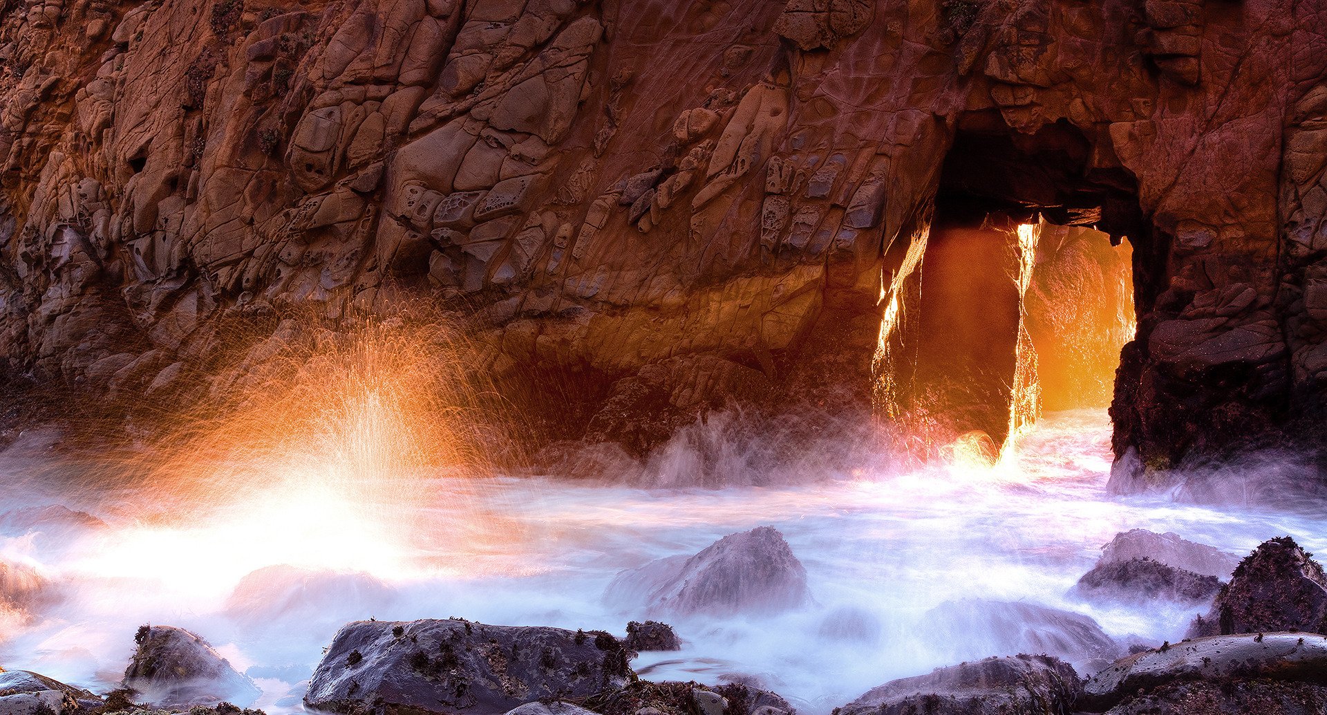 felsen grotten spritzer wasser ozean meer bogen licht