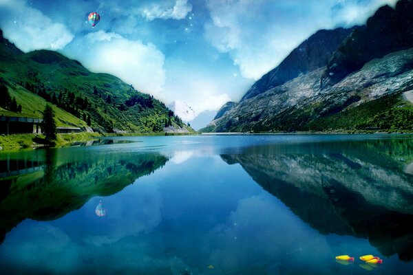 Glass lake on the background of mountains and clouds