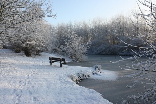 A lonely shop on the bank of a frozen river