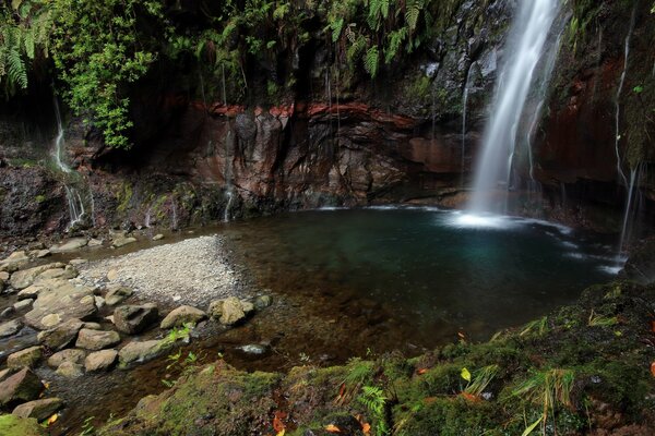 A beautiful waterfall among the stones