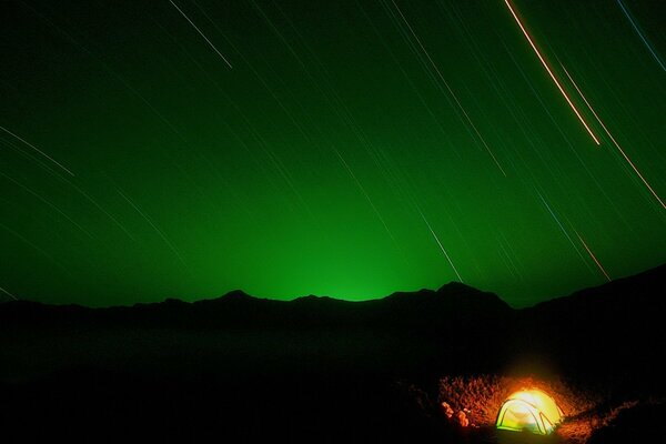 The tourist tent in the photo at night is a romance