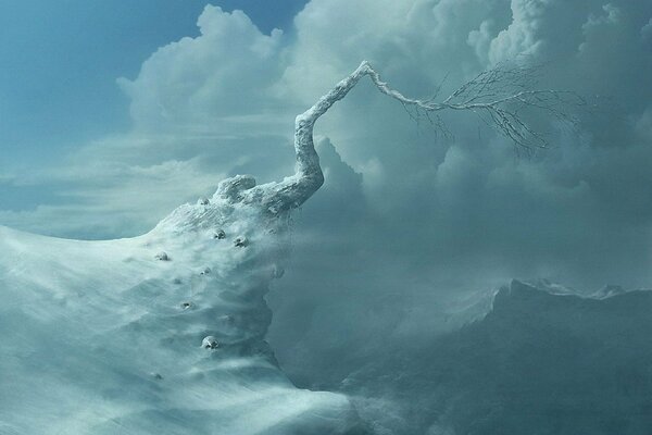 Frightening snowy slope with thunderclouds in the distance