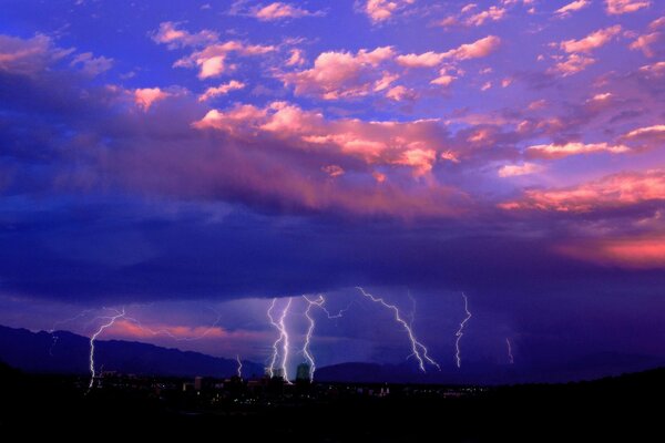 Lightning over the city. Beautiful clouds