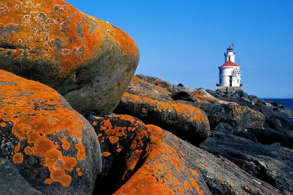 View of the lighthouse from the rocky shore