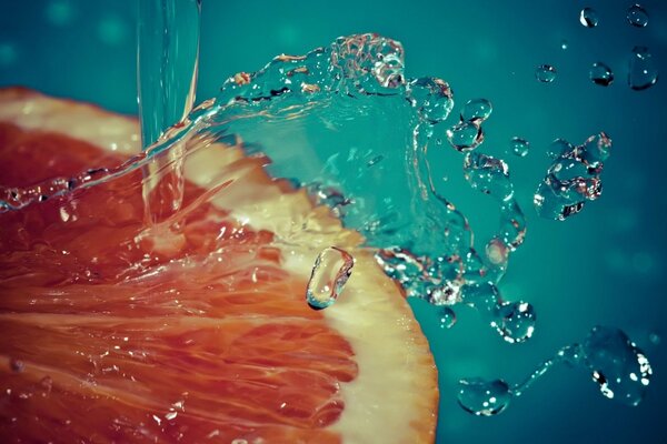 A slice of juicy grapefruit and a splash