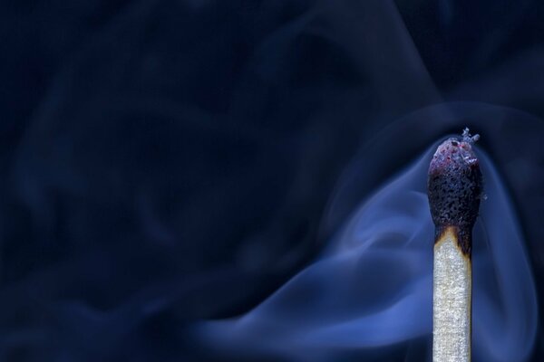 Macro of a burning smoking match