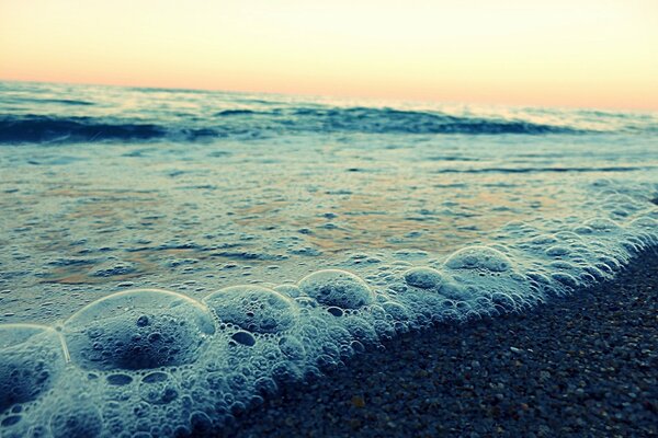 Imagen macro de surf temprano en la mañana