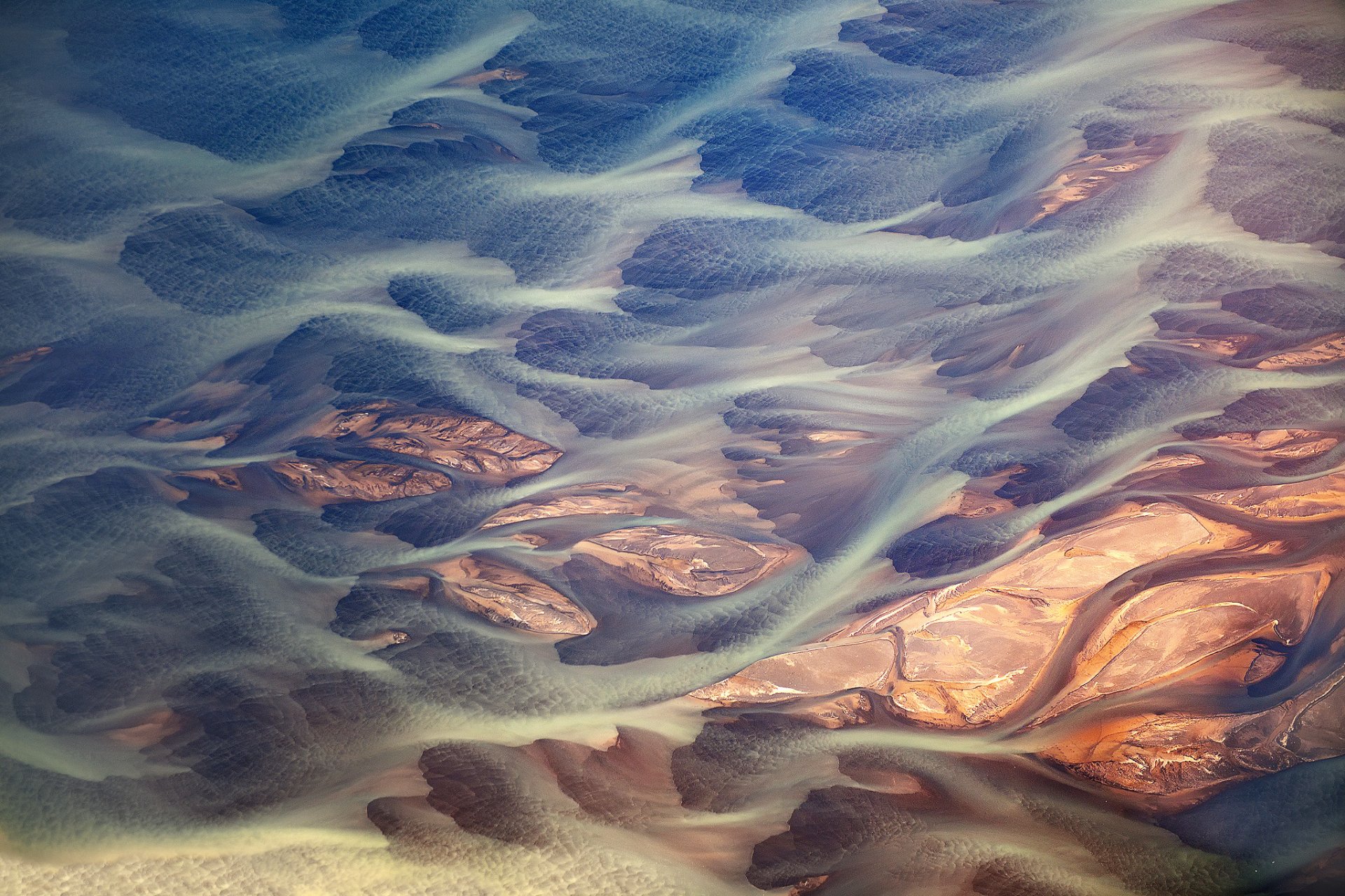 islandia paisaje abstracto ríos arroyos arroyos polvo volcánico barro glaciar textura patrones