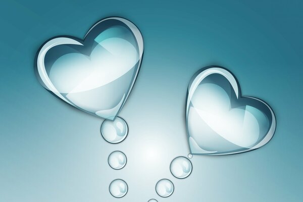 Hearts with droplets on a blue background