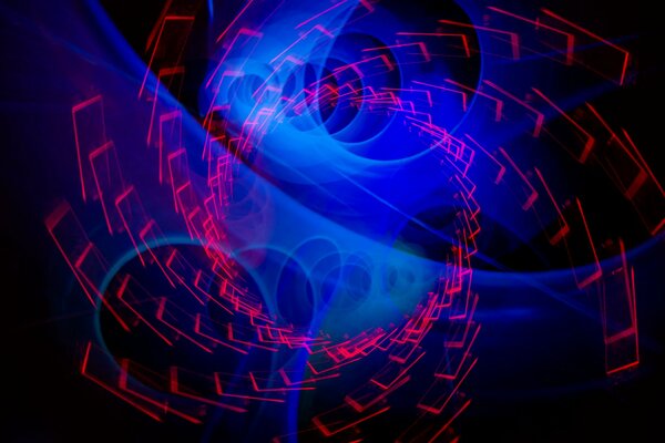 Spirale di pramoungoli di luce rossa su sfondo blu