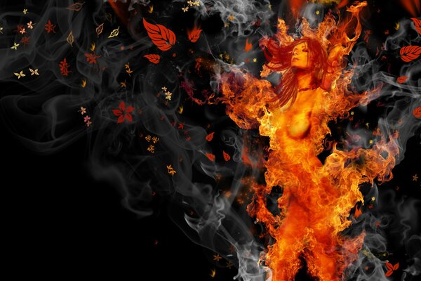 The girl turns into fire on a black background