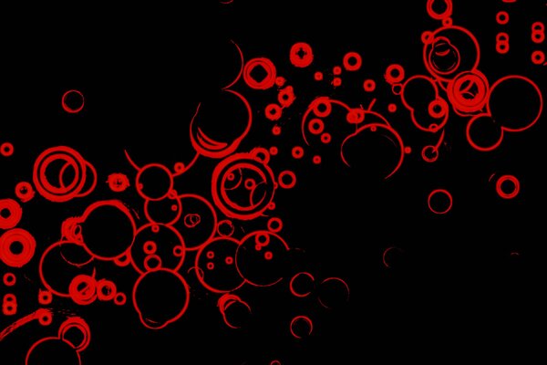 Psychology of abstraction with the image of a black background and red circles