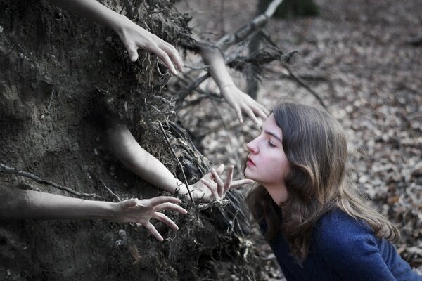 A girl in the forest. Hands. Fantasy