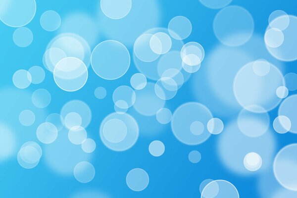 Burbujas blancas abstractas sobre fondo azul