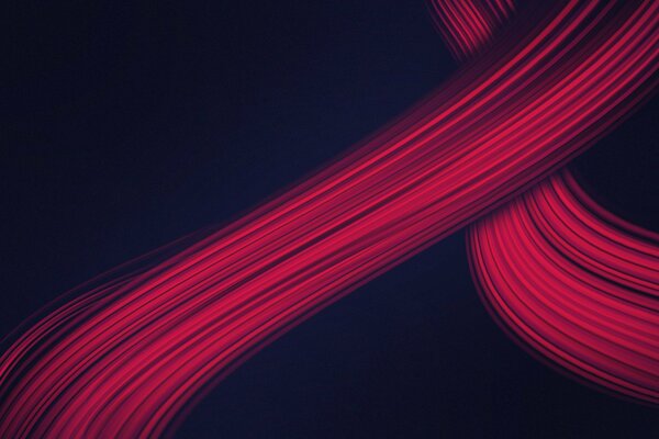 Abstract waves of red on a black background