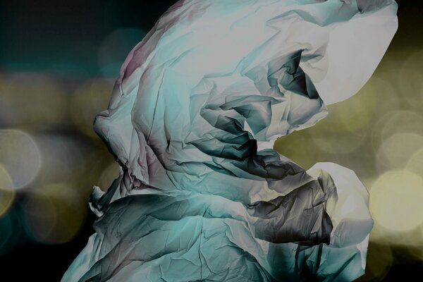 Crumpled fabric on a blurry background