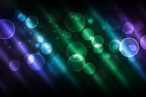 Black background with green, blue, blue and purple stripes and circles